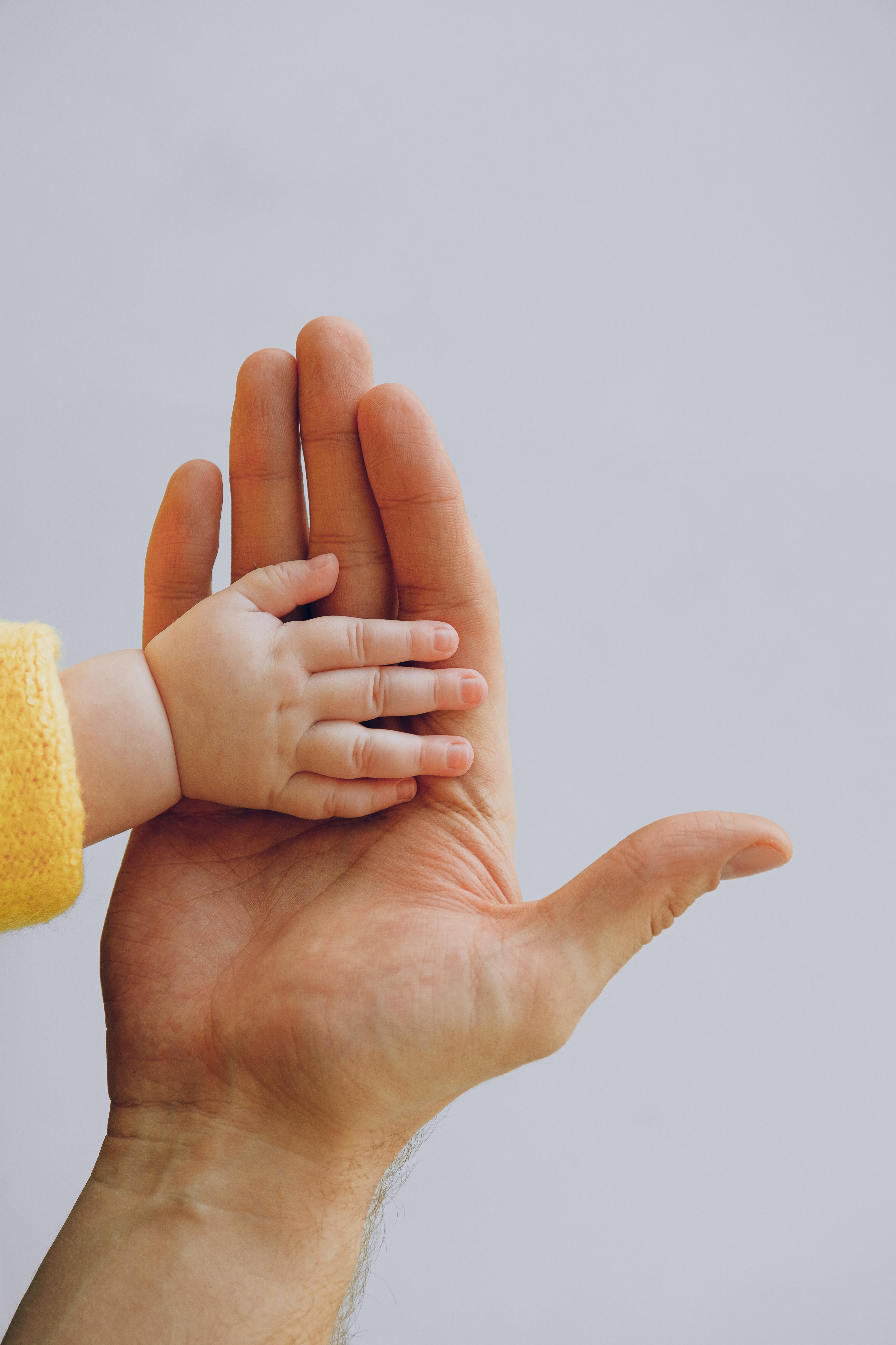 mano de hijo y de padre